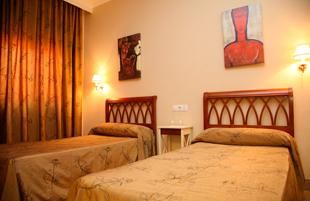 Hotel Torre del Oro camas