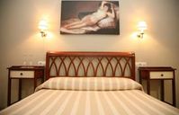 Hotel Torre del Oro cama de hostal